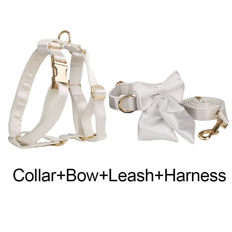 White satin collar, bow tie, leash, and harness set with gold hardware