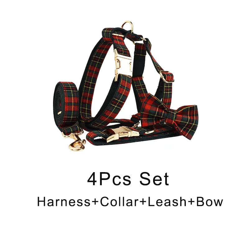 Red tartan dog harness with collar and leash accents, gold hardware