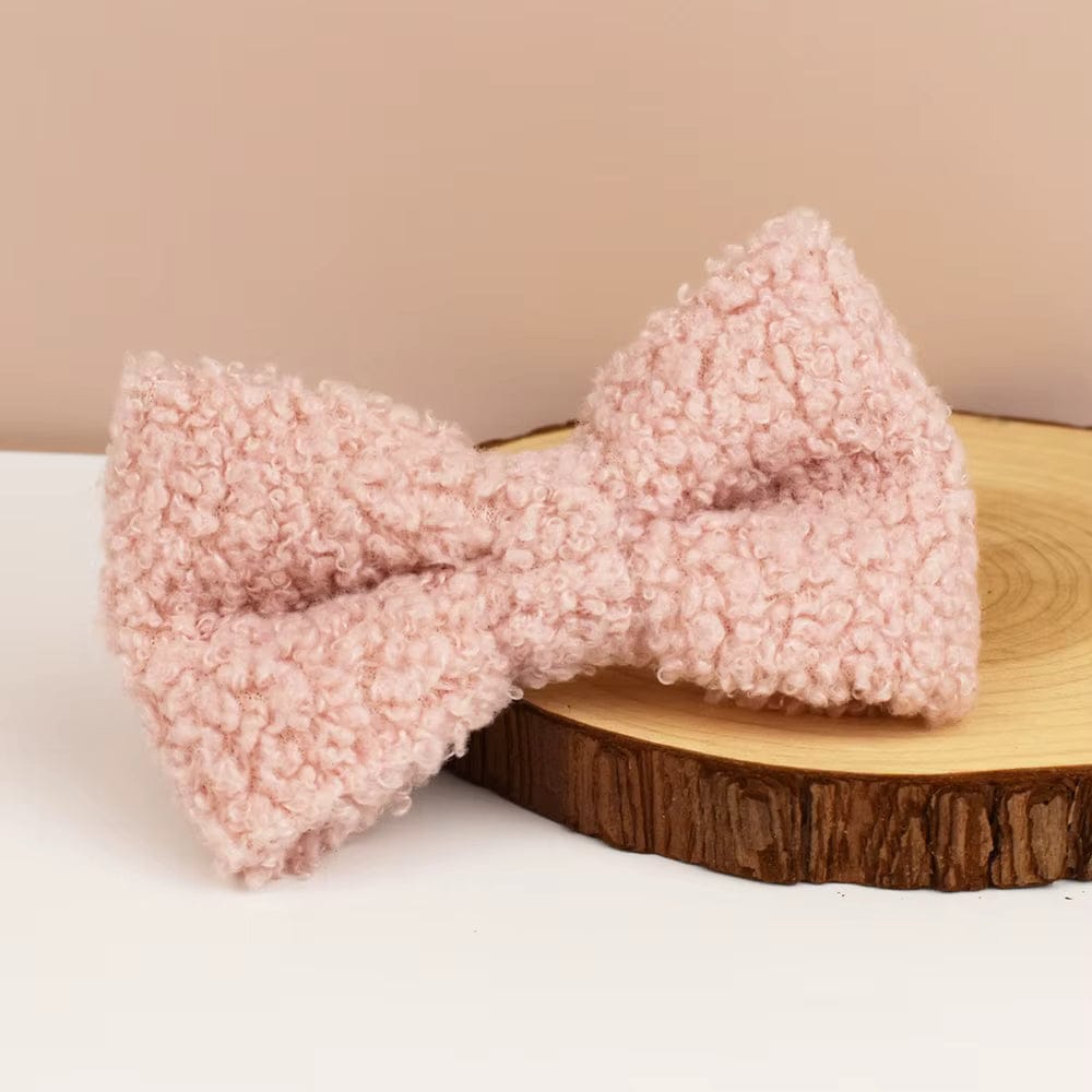 Pink teddy plush dog bowtie with textured fabric, gold pin hardware