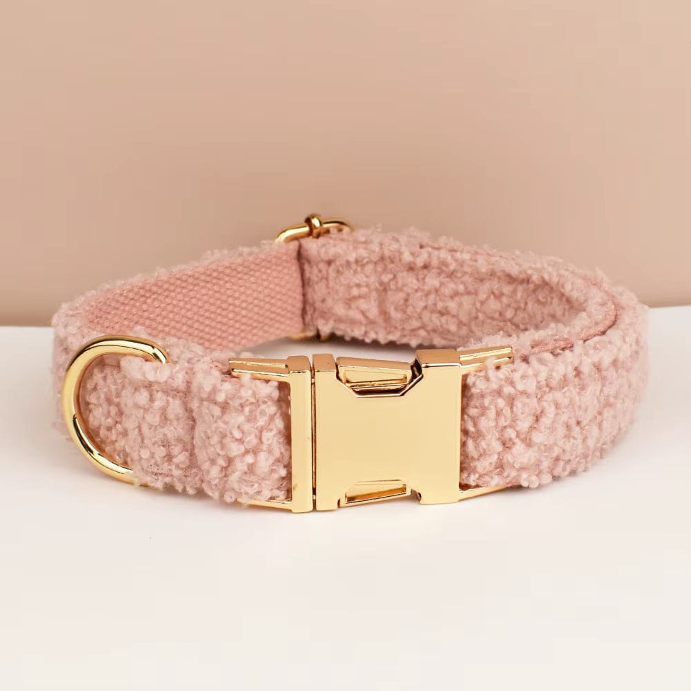 Pink teddy plush dog collar with gold buckle and D-ring, close-up view
