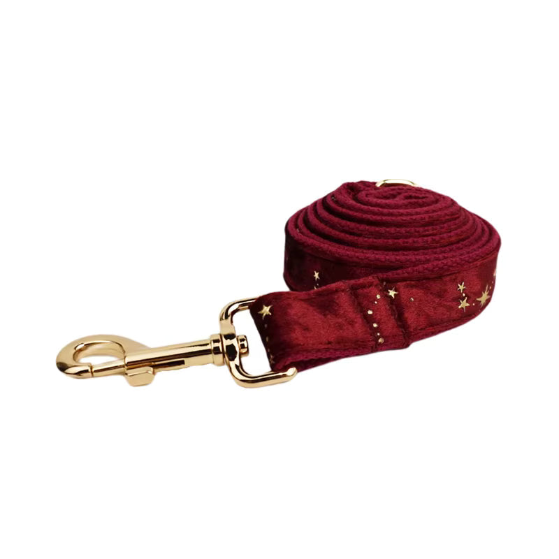 Wine velvet dog leash with gold star accents and gold-tone clip, rolled handle