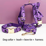 Purple dog collar, leash, bow tie, and harness set with gold hardware and bat print