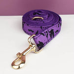 Purple dog leash strap with gold clip and Halloween bat print