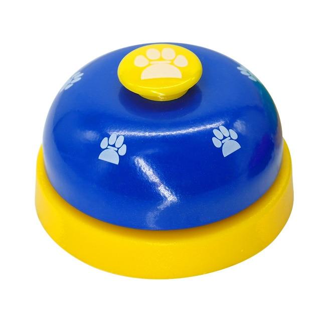 Blue pet training bell with yellow paw button and white paw-print decals