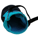 Folded blue dog shoe cover with black trim and hook-and-loop fastening