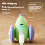 Green cat teaser mouse toy showing USB charging port and switch under the belly