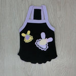 Black cotton suspender pet vest with lavender trim and embroidered flower appliques