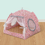 Red leopard-print pet tent bed with open mesh panels and round padded side entrances