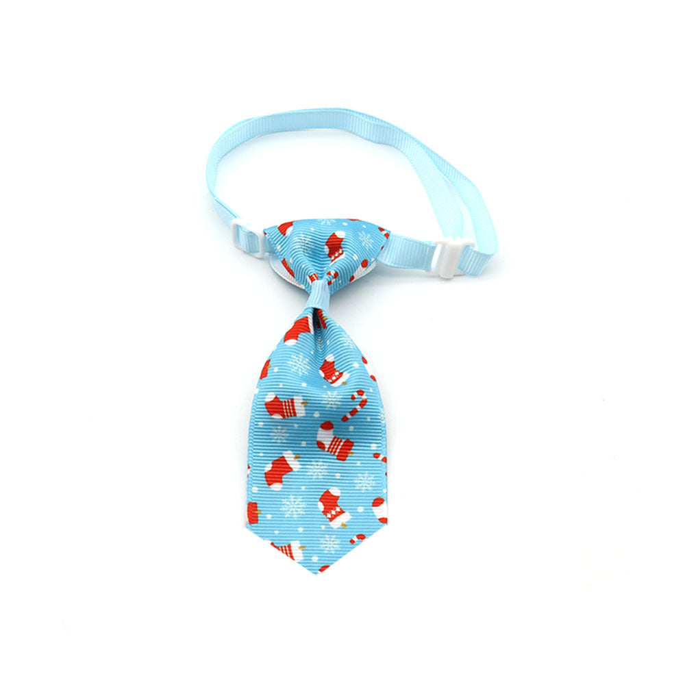 Pet bow tie with light blue strap and blue holiday neck tie with red reindeer pattern