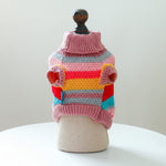 Pet striped acrylic sweater on mannequin, ribbed turtleneck and colorful horizontal bands