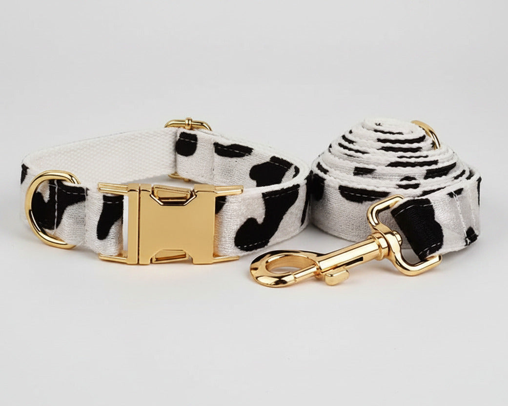 Collar, bow tie and leash set in white with black spots with gold clasps
