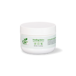 Healing salve jar with white lid and green label, net wt 1 oz (28 g)