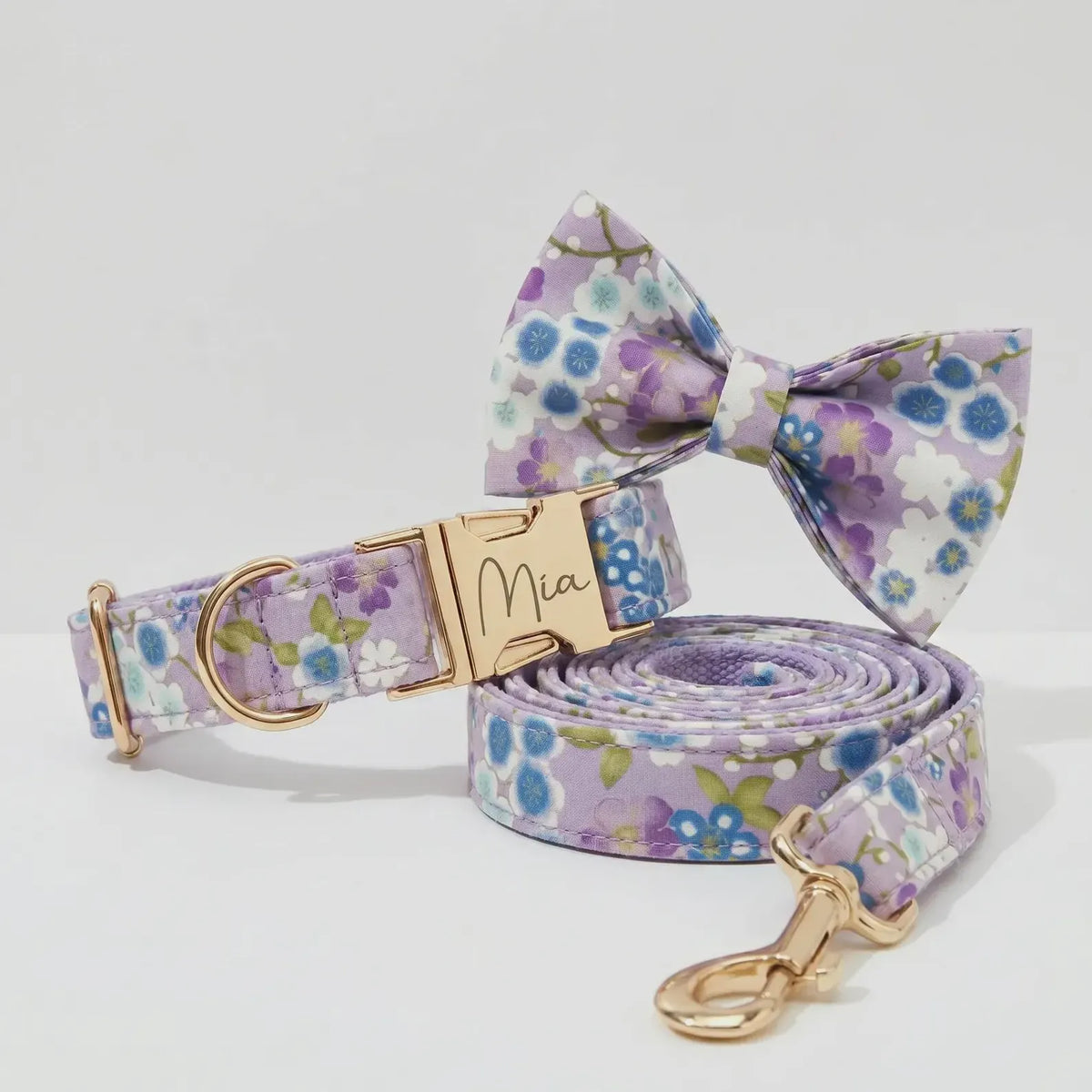 Personalized lilac meadow floral dog collar with bow tie and matching leash, gold hardware