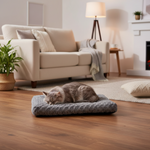 Gray plush rectangular pet bed with a sleeping cat