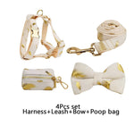 Ivory velvet harness, rolled leash, bow tie, and small pouch with gold leaf print
