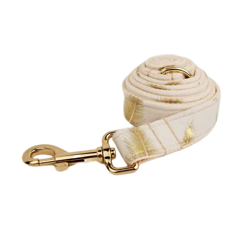 Ivory velvet dog leash with rolled strap design and gold leaf feather print