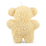 Cream fuzzy pig plush squeaker dog toy, back view with curled tail