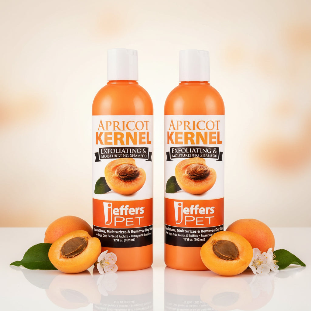 Two Apricot Kernel exfoliating & moisturizing pet shampoo bottles, orange with white caps.