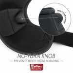 Black no-turn bell boots close-up of no-turn knob seam detail on cuff
