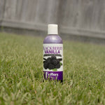 Jeffers Pet Blackberry Vanilla pH-neutral pet shampoo bottle standing in grass