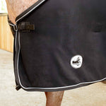 Horse fleece cooler blanket, black side view with round logo patch and white trim