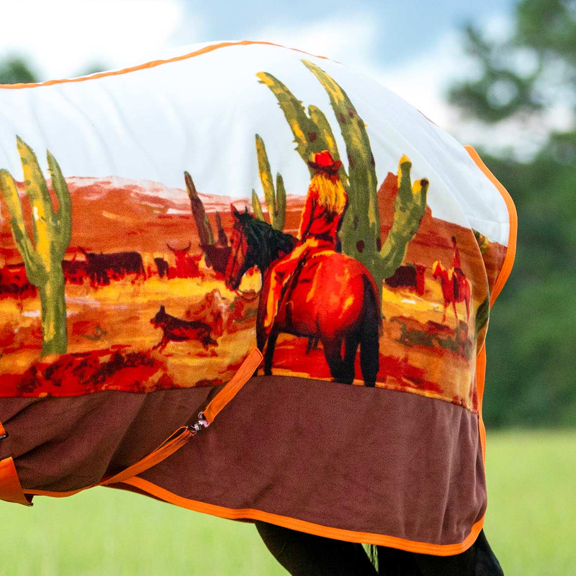 Horse cooler fleece with orange desert scene and cacti print, side close-up