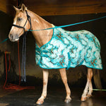 Teal fleece horse cooler with cloud-like pattern and teal straps