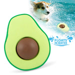 Avocado-shaped floating rubber dog chew toy with brown center, lime green body