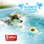 Avocado-shaped floating rubber dog chew toy with brown center in water