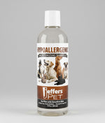 Pet shampoo bottle, front label view on plain background