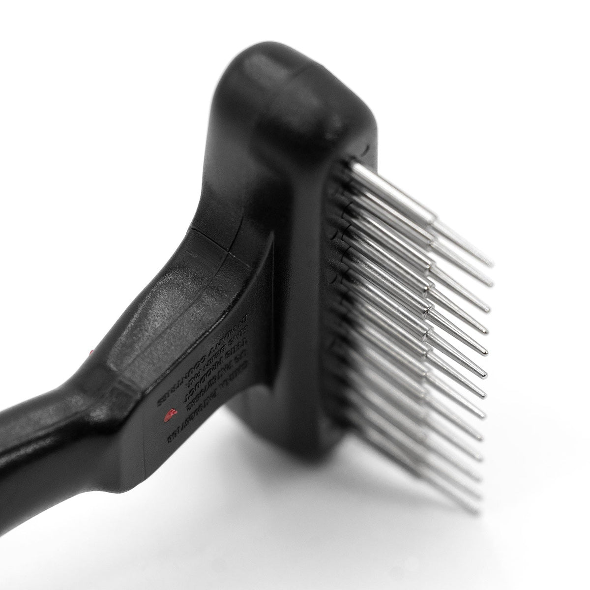Pet grooming undercoat rake head with spring metal pins on black handle