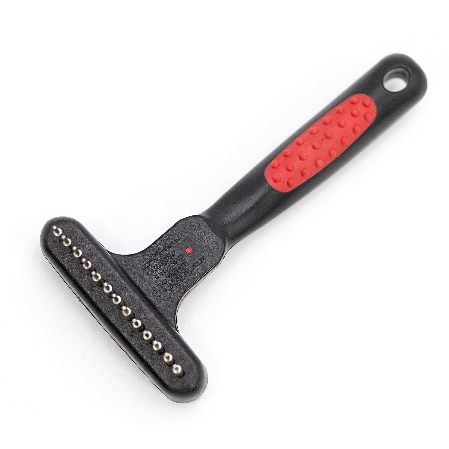 Pet undercoat grooming rake with spring metal pins and black handle with red grip