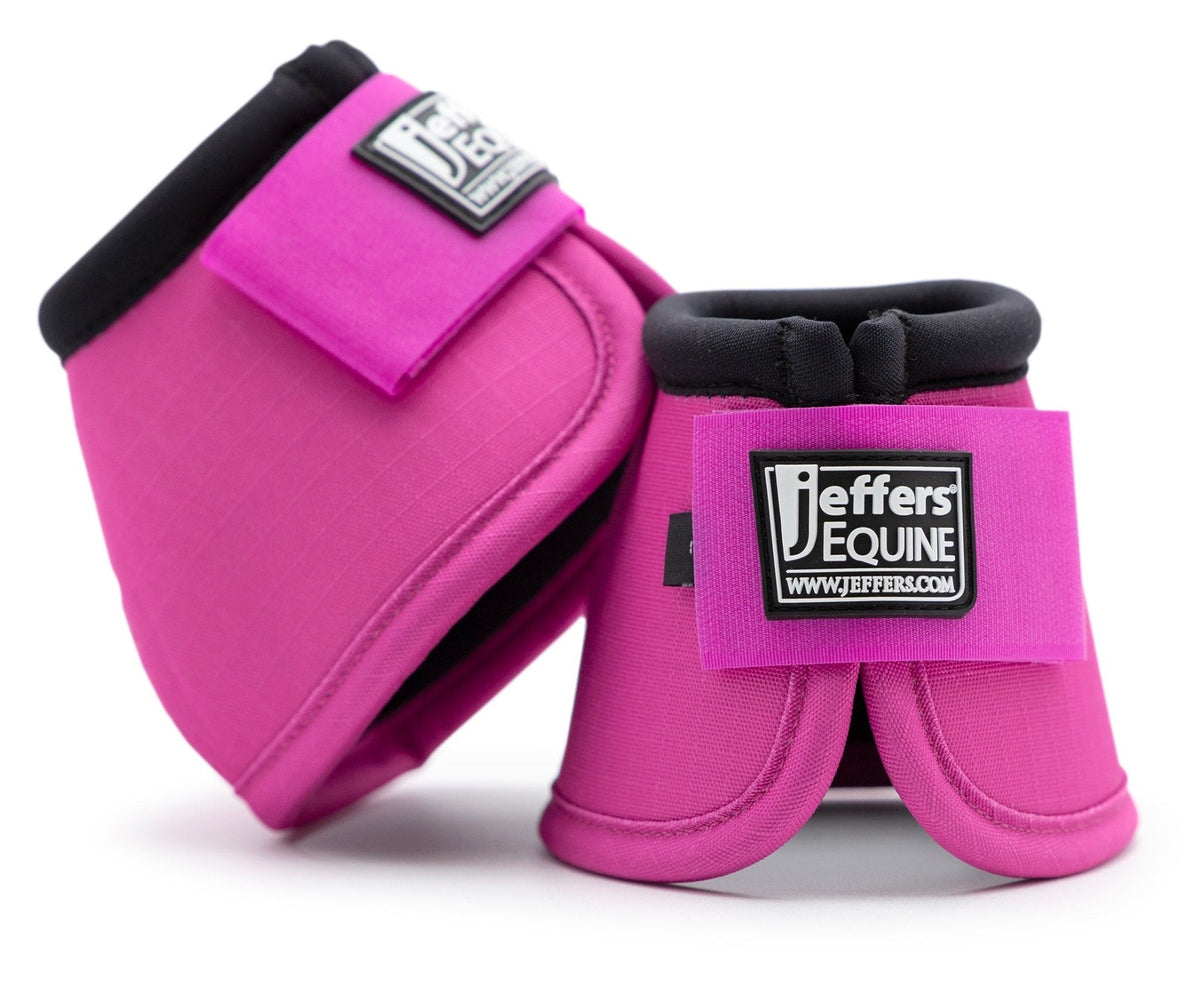 Pink horse bell boots set with black trim and Jeffer's Equine logo patches.