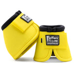 No-Turn bell boots for horses, bright yellow with black padding and hook-and-loop straps
