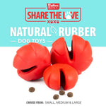 Red multi-lobed treat-dispensing dog chew toy with central oval opening