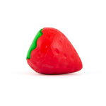Strawberry-shaped natural rubber dog chew toy with red body and green trim