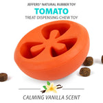 Red tomato-shaped treat-dispensing chew toy with star cutout pattern for dogs