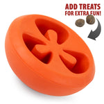 Red tomato-shaped natural rubber treat dispensing dog chew toy with textured holes
