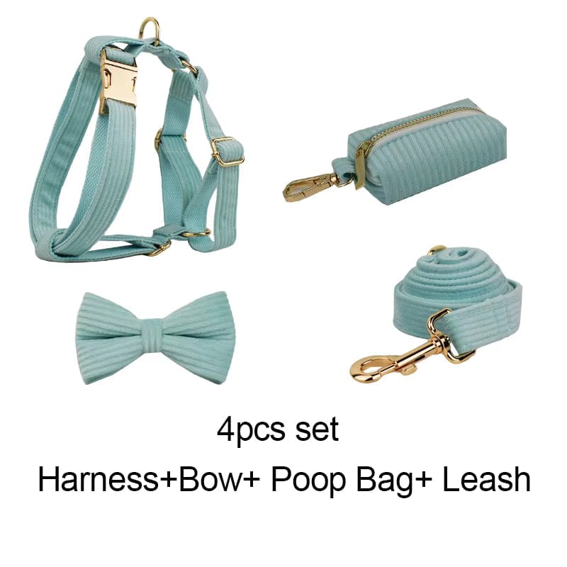 Teal corduroy pet harness set with bowtie, leash, and poop bag