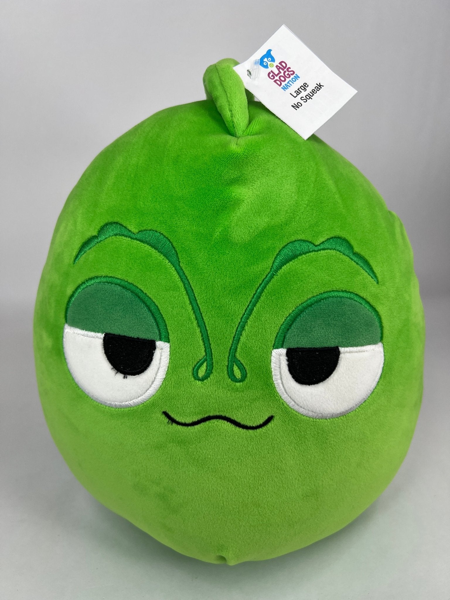 Large squishy frog plush, bright green with big white eyes and stitched smile