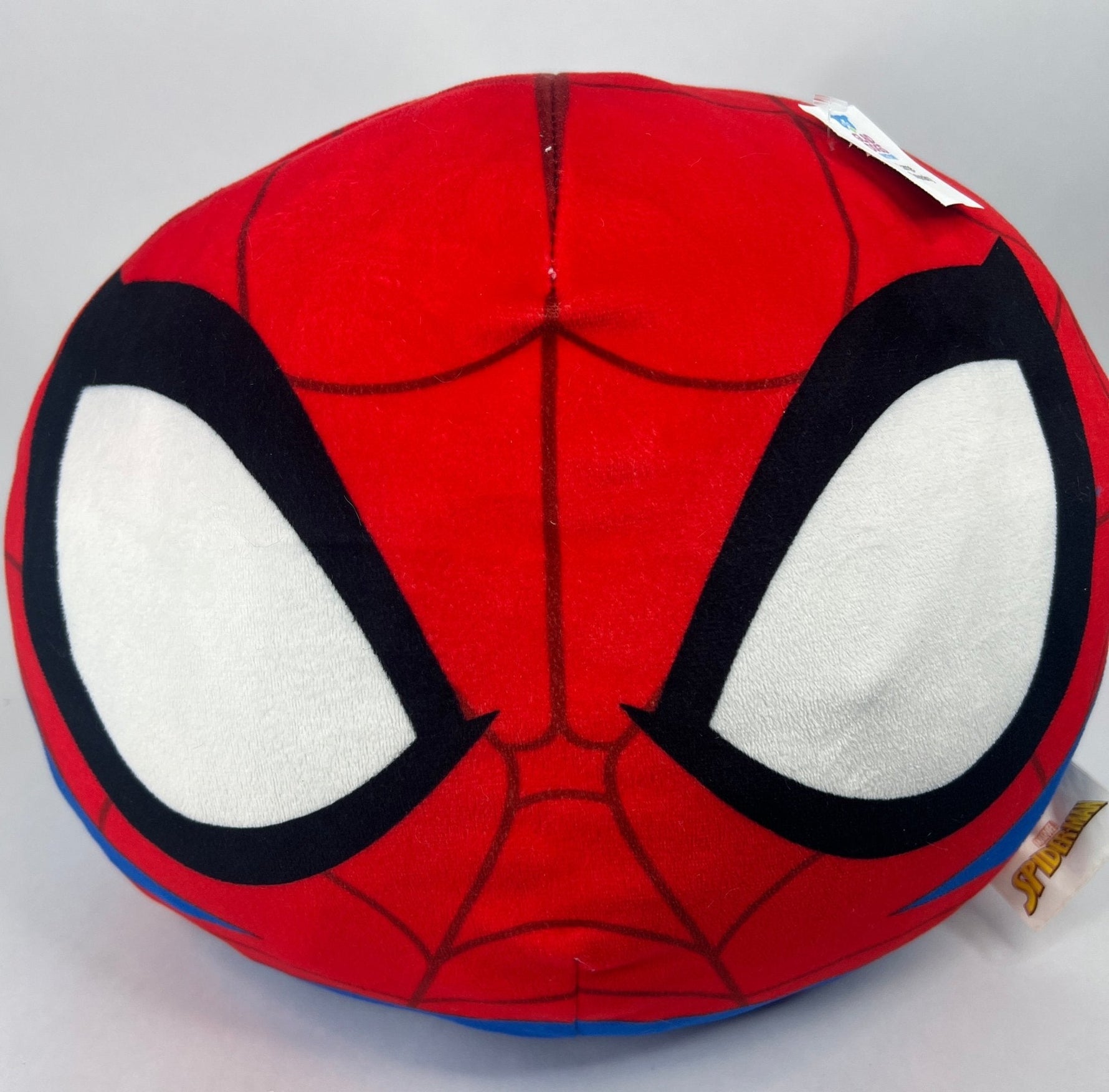 Large squishy Spiderman plush, red-and-blue with black web mask face design