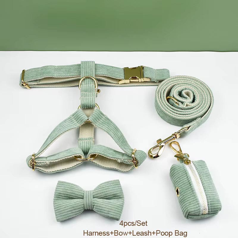 Light green corduroy pet harness, collar, bowtie, leash, and poop bag set with gold-tone