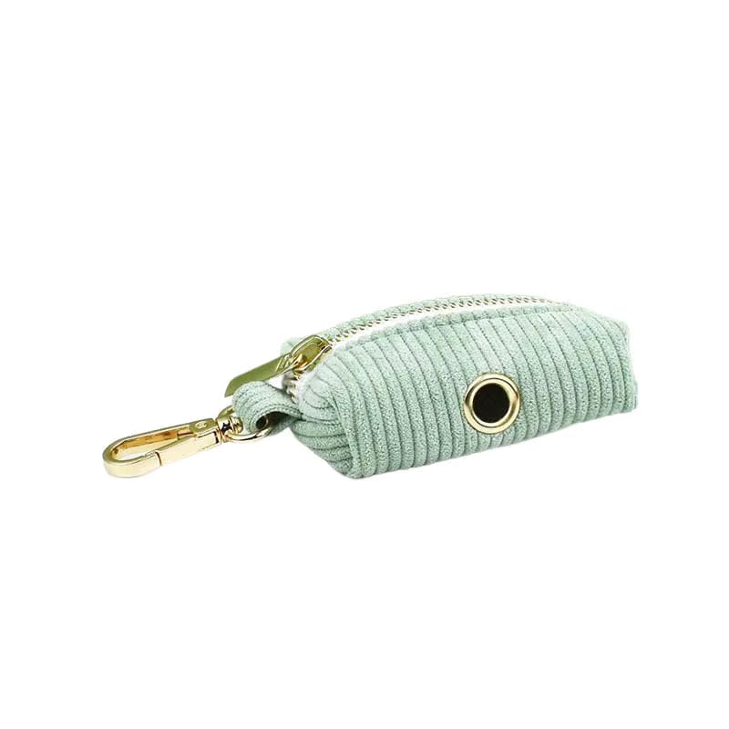 Light green corduroy poop bag holder with gold-tone clasp and round grommet
