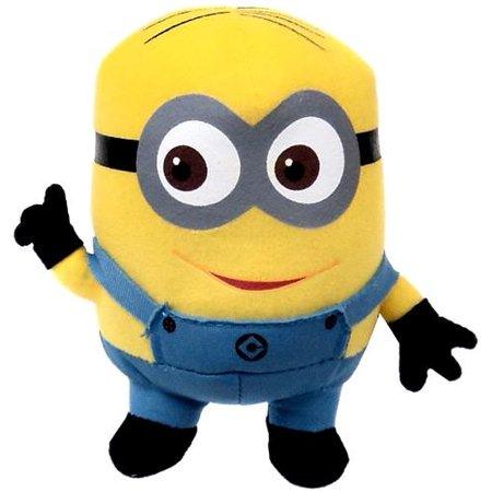 Yellow minion plush with wide eyes, blue overalls, black gloves, and smiling mouth