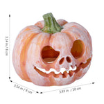 Pumpkin resin fish hideout with jack-o-lantern cutouts, green stem