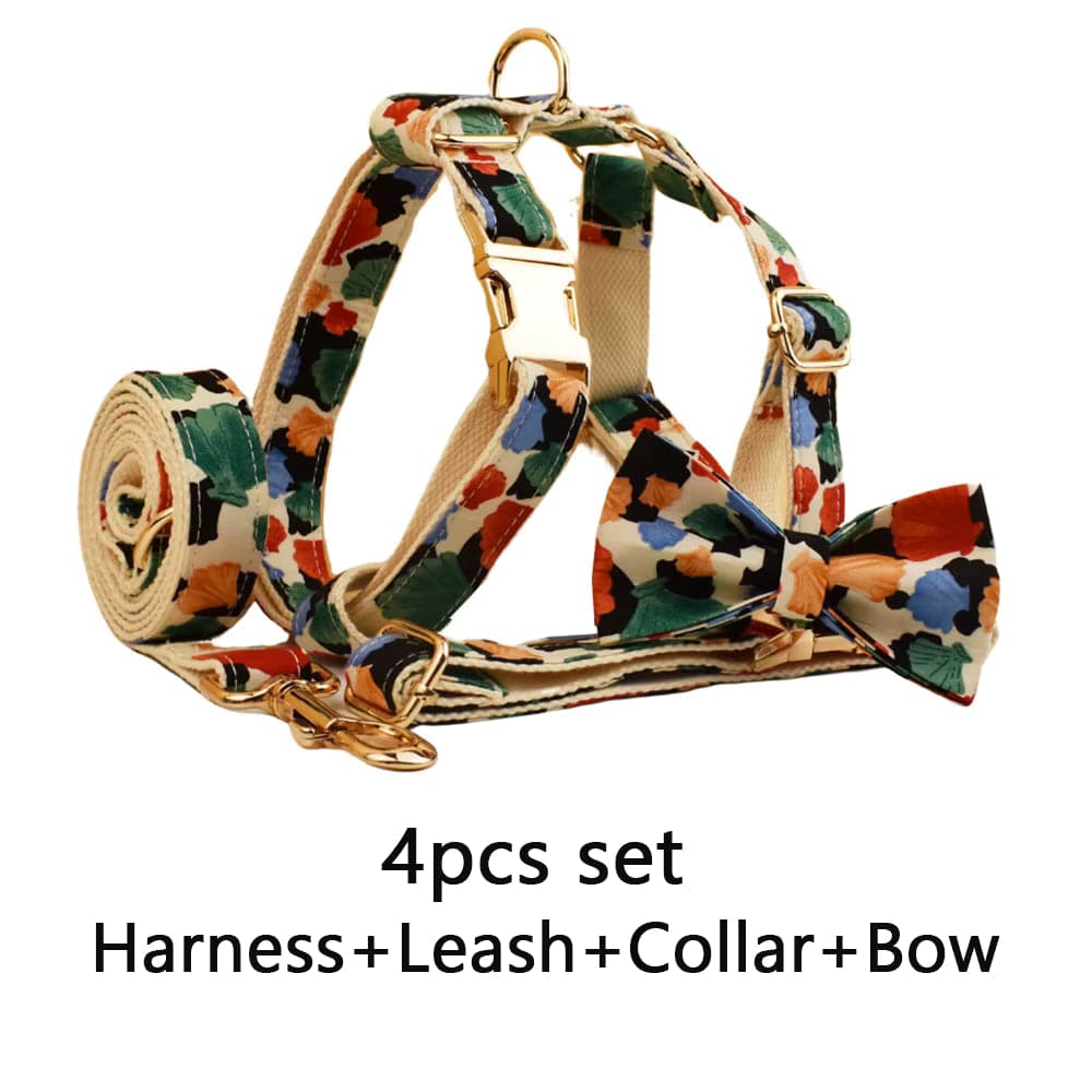 Floral pet harness with coordinating leash accessory, beige straps with multicolor leaf pattern