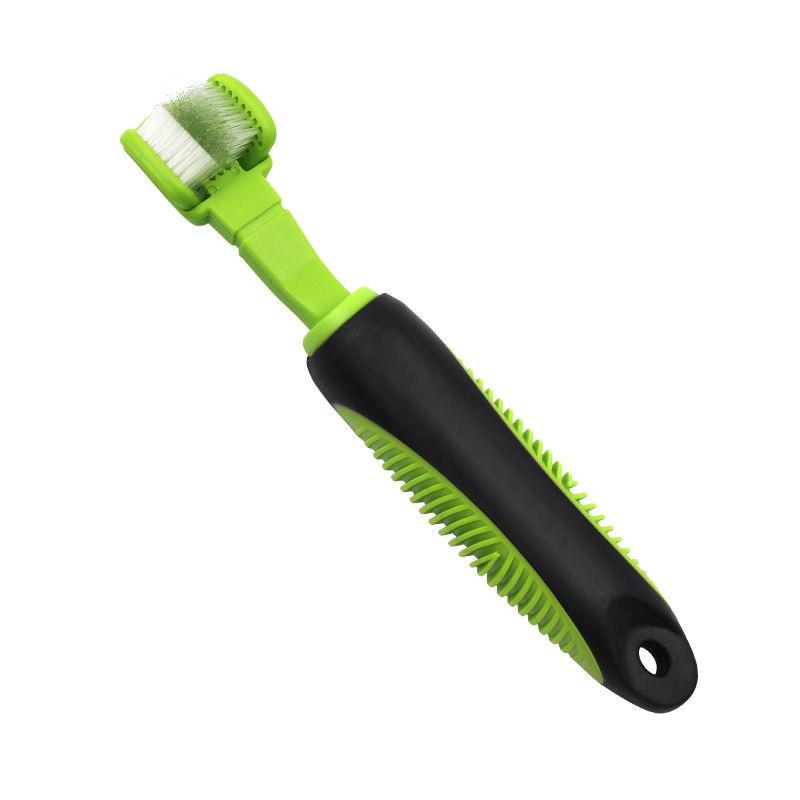 Pet toothbrush with green bristle head and black handle