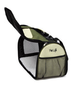 Green-and-black collapsible dog carrier with mesh window and top carry handle