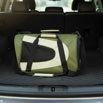 Green and cream foldable dog carrier with mesh side, zippered door and handles