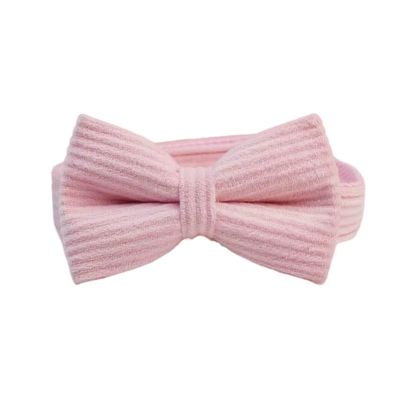 Pink corduroy bowtie accessory with adjustable band and bow knot